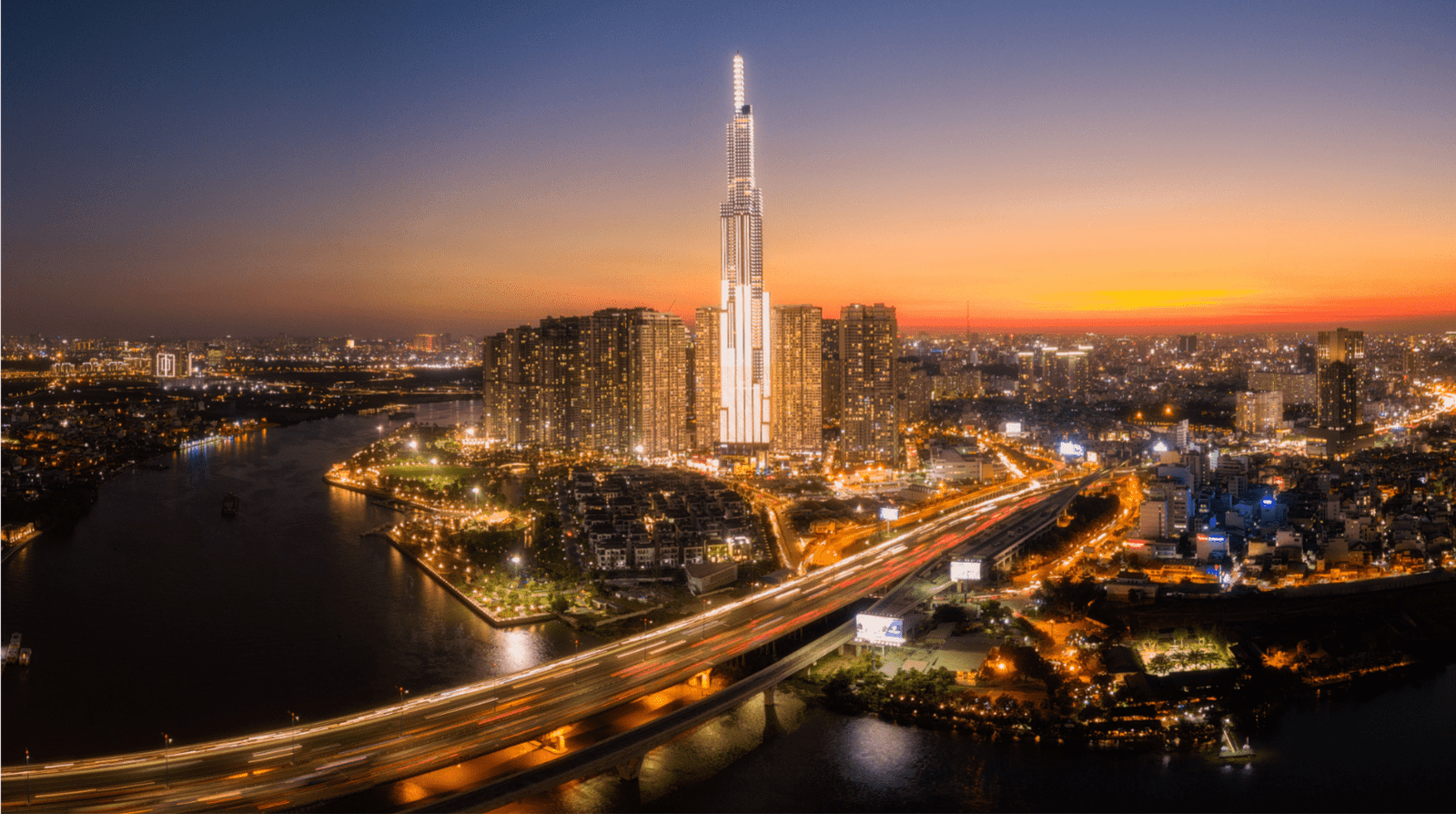 Aerial View of Ho Chi Minh City, Vietnam at Night – Landmark 81 and Saigon River Skyline